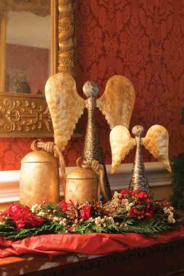 VivaTerra's reclaimed metal temple bells, angels handmade from oil drums washed up in Haiti, and organic, wild-harvested cedar and hydrangea blend elegance with sustainability.